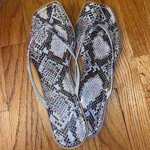 Brand new snakeskin sandals. Never worn!